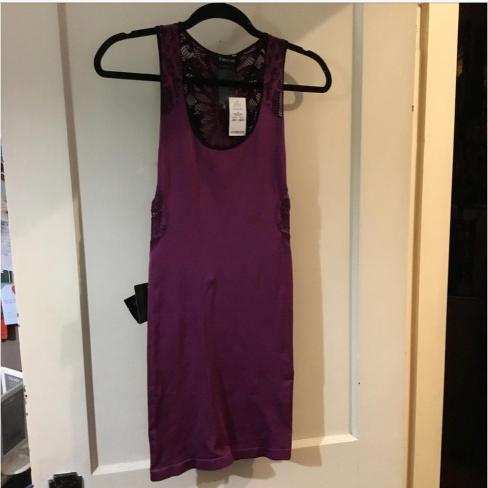 Ladies Bebe dress w/ cut-out detail. Make an offer